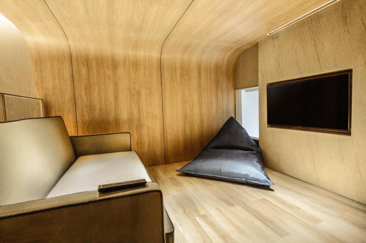 植物保护区酒店 普卡 外观 照片 Interior of a capsule hotel