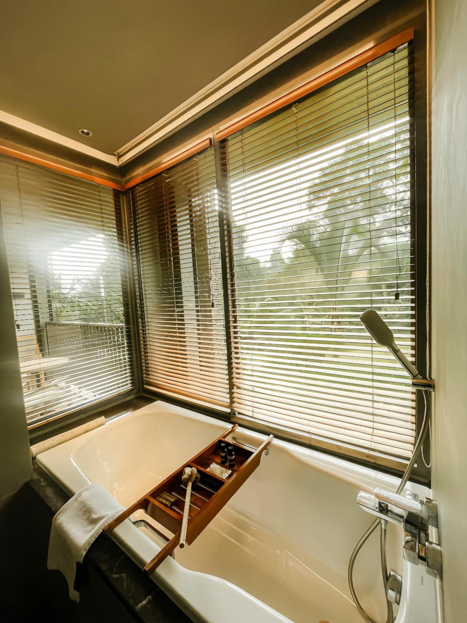 植物保护区酒店 普卡 客房 照片 Venetian blinds